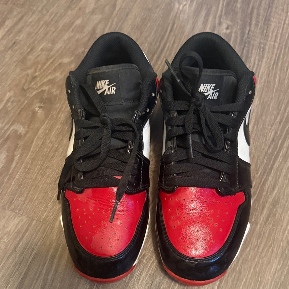 Nike Air Jordan Black and Red Cleats